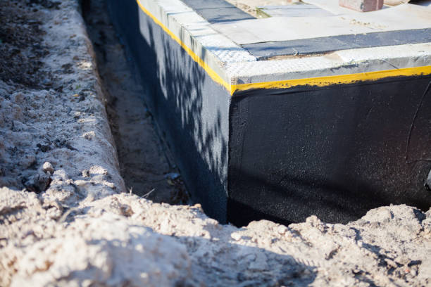 Professional Waterproofing technician working in West College Corner, IN